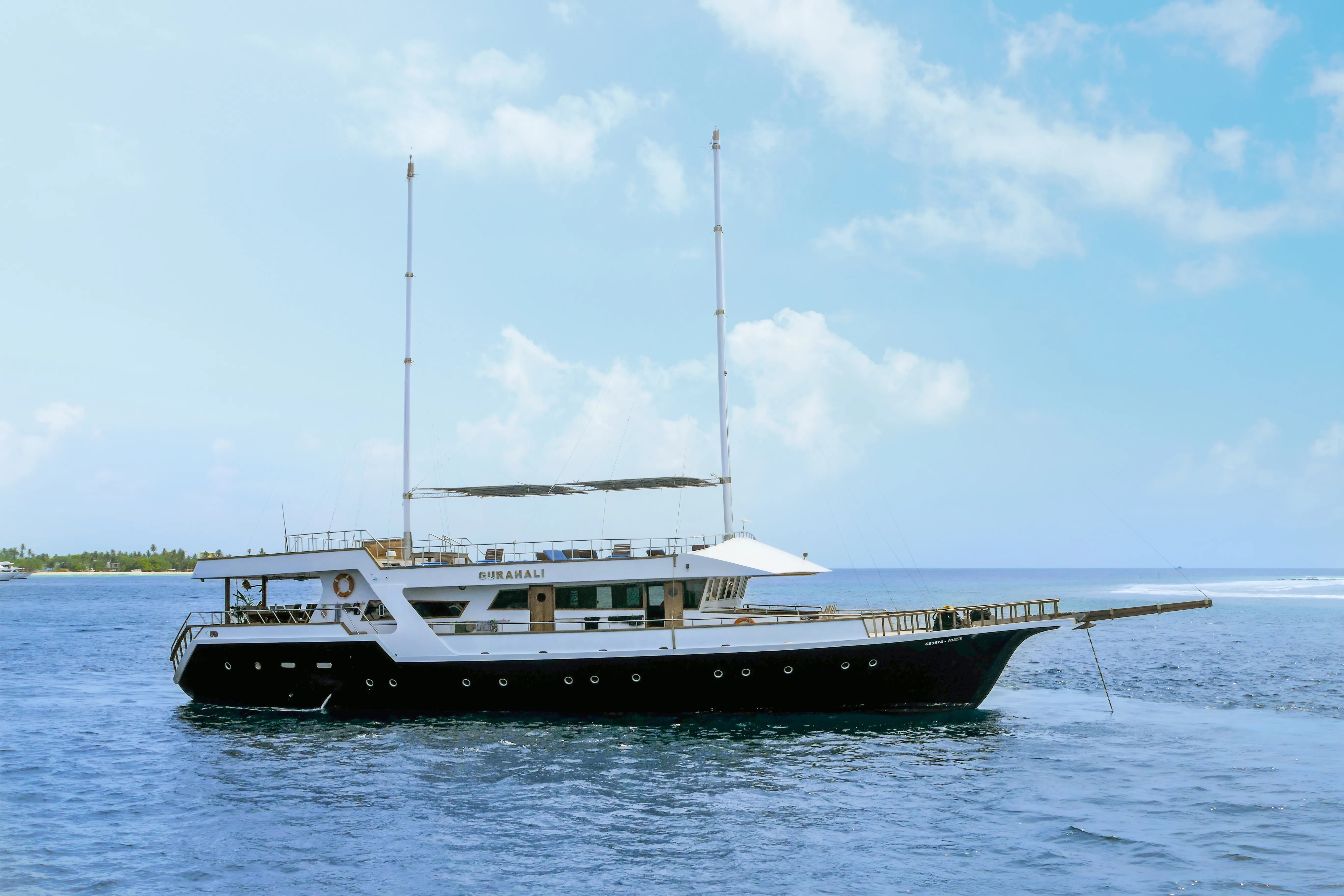 surfing in the maldives on gurahali